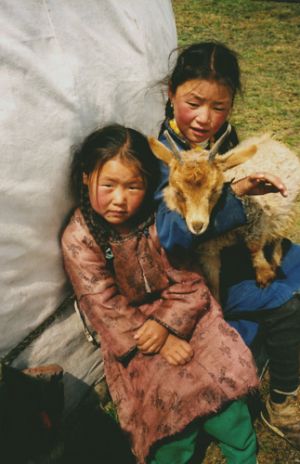 Mongolian Sisters Outside Their Yurt 